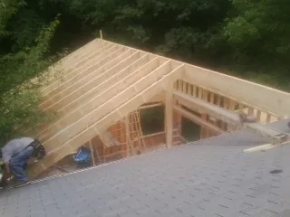 Framing a new roof addition that ties into an existing shingle roof in Kanab